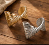SCULPTED WING CUFF