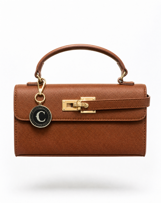 THE UPTOWN MINI CLUTCH