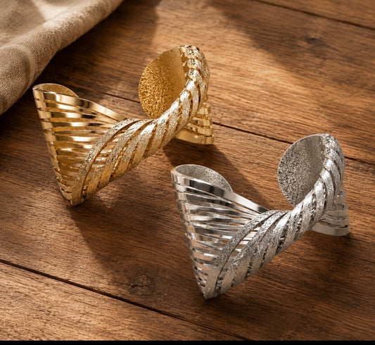 SCULPTED WING CUFF