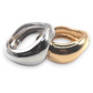 Two metallic rings, one silver and one gold, on a white background