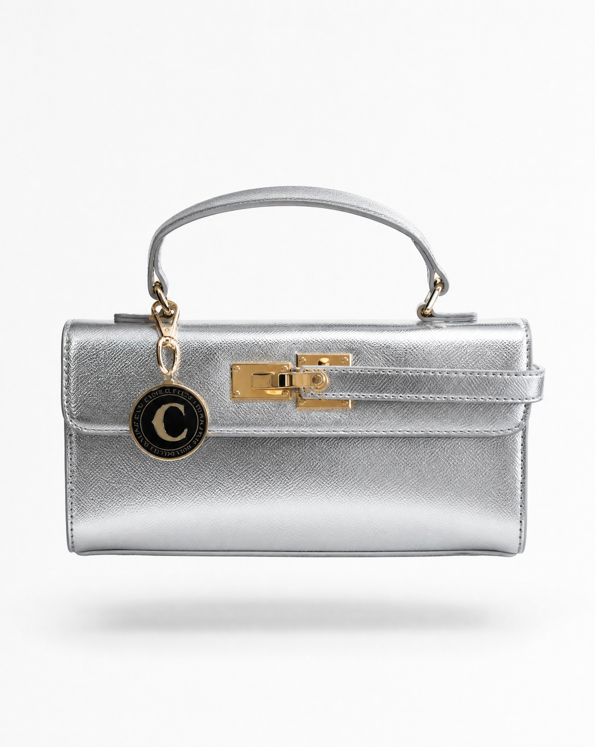 THE UPTOWN MINI CLUTCH